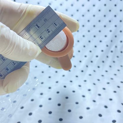 Sakura Fini Dragon Scale Condom - Increased size and thickness with large, spiked particles.