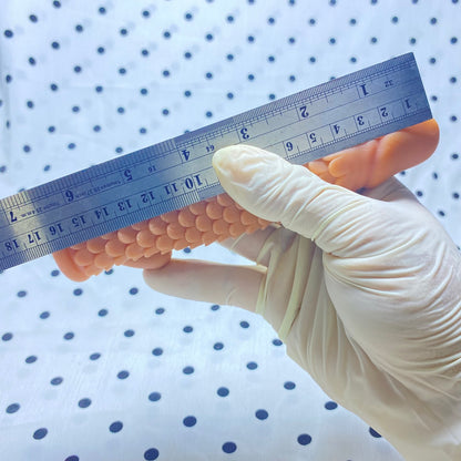 Sakura Fini Dragon Scale Condom - Increased size and thickness with large, spiked particles.