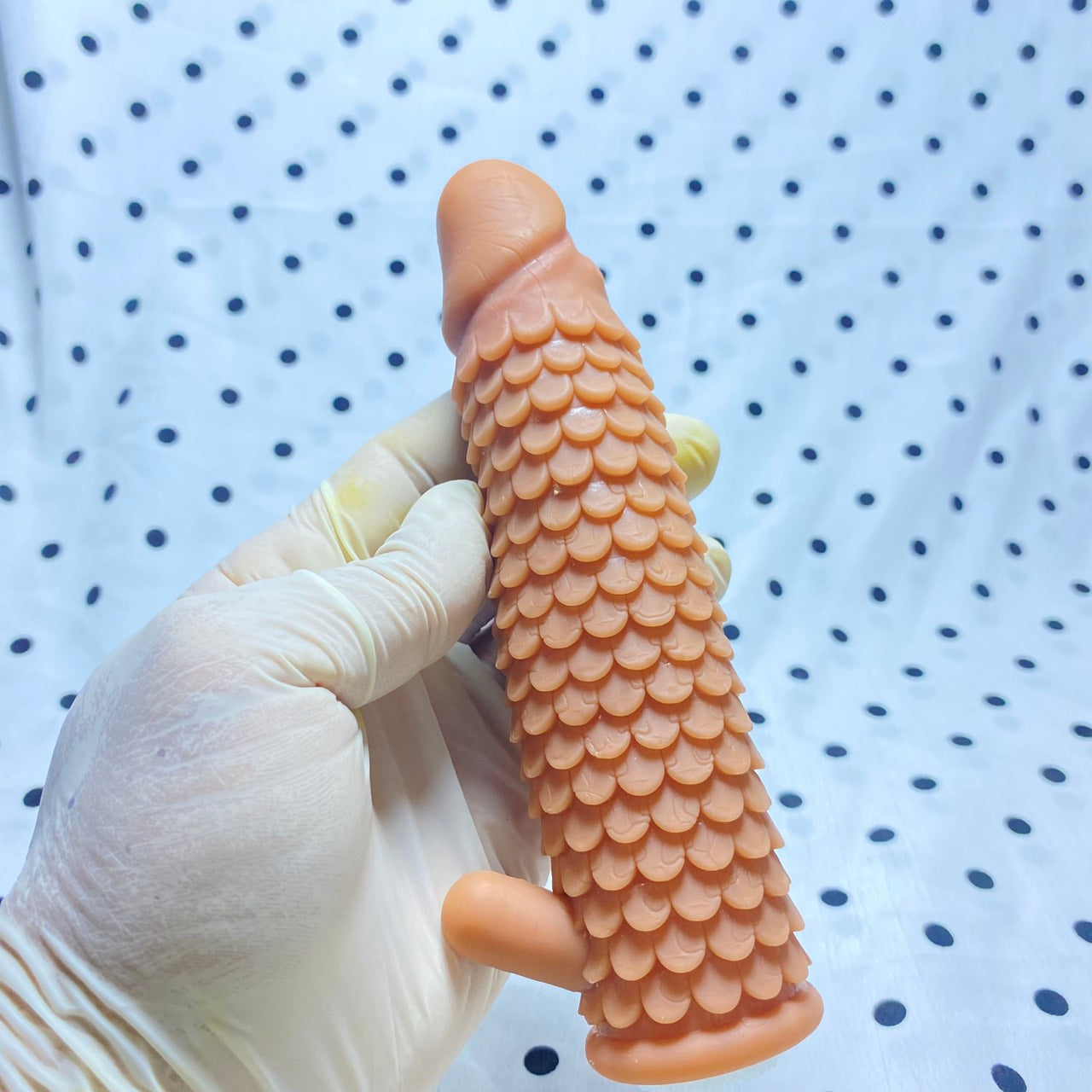 Sakura Fini Dragon Scale Condom - Increased size and thickness with large, spiked particles.